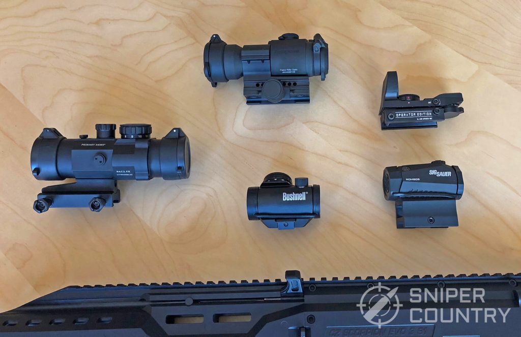 Selection of red dot sights and 9mm carbine