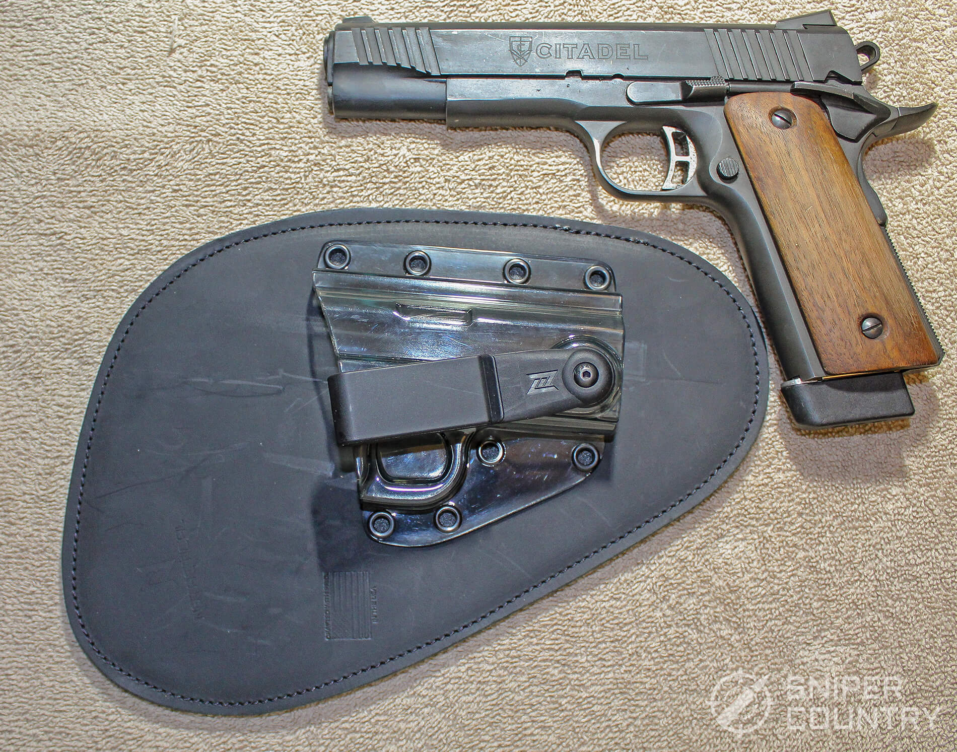 The 1911 next to professional holster