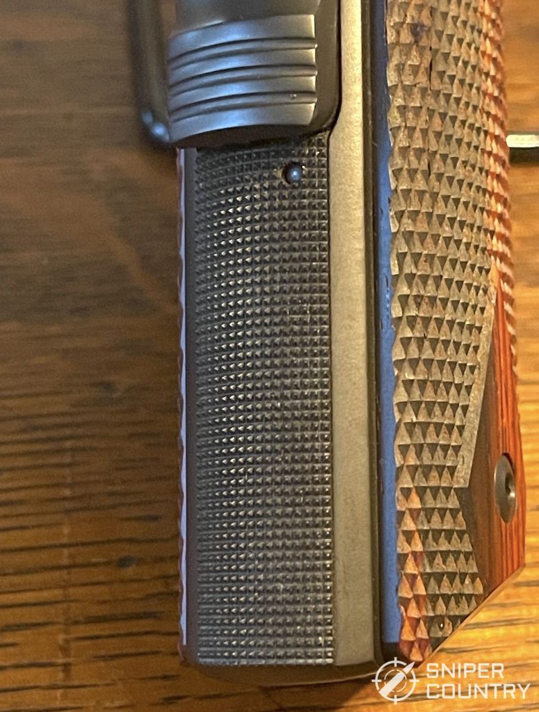 The 25 line per inch checkering on the front and back of the Ed Brown Classic Customâ€™s grip. The finish has just the right â€œroughnessâ€ to give the gun a fantastic feel in hand.