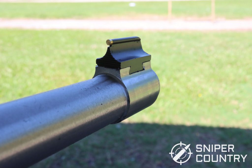 The business end of the Ruger 10:22 Takedown’s barrel, showing the dovetailed front sight. The brass dot provides a clear sight picture