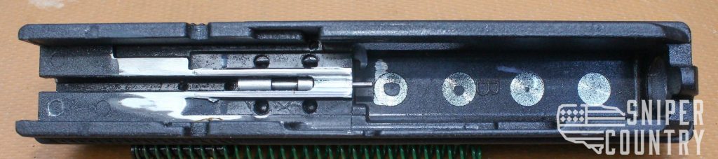 Underneath the slide of the Hi-Point C9