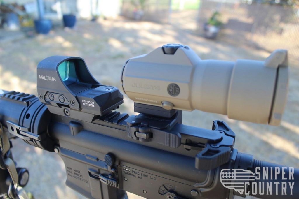 Holosun 510C: Best value red dot sight? Holosun 510C with the + and â€“ button on the left side