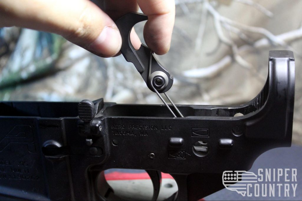 force the hammer forward until it is lined with the front trigger pin hole