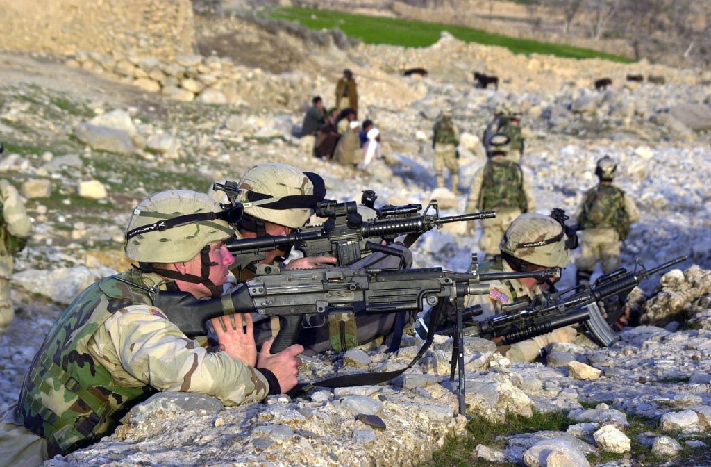 Armed M4 Carbines and M249 (SAW) light machine guns, soldiers with "C" Company, 2nd Battalion, 504th Parachute Infantry Regiment participating in Operation Viper in Baghran Valley, Afghanistan, during Operation ENDURING FREEDOM.